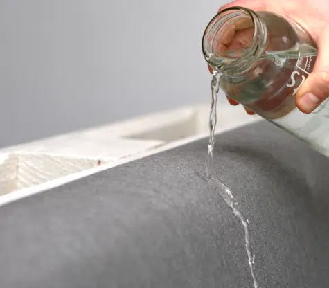 wasserabweisende Palettenkissen getstet mit Glas Wasser